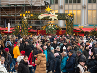 The entrance of the Cologne Dom Christmas Market in Cologne, Germany, on December 7, 2024, is completely packed with visitors. (