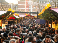 The Cologne Dom Christmas Market in Cologne, Germany, is completely packed with visitors on December 7, 2024. (