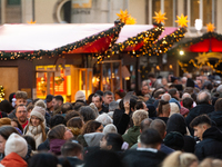 The Cologne Dom Christmas Market in Cologne, Germany, is completely packed with visitors on December 7, 2024. (