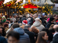 The Cologne Dom Christmas Market in Cologne, Germany, is completely packed with visitors on December 7, 2024. (