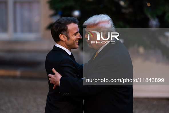 On the sidelines of the grand reopening ceremony of the Notre Dame Cathedral in Paris, France, on December 7, 2024, French President Emmanue...