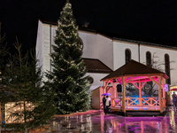 Umbrellas adorn the festive scene in Starnberg, Bavaria, Germany, on December 7, 2024, as the Christmas market embraces the charm of a rainy...