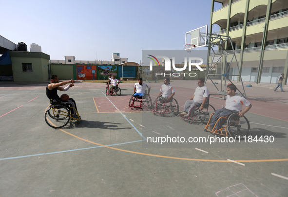 Al Bassma Club Team members during training in the school at Beit Lahiya in the northern Gaza Strip, on April 6, 2016.  Al-Bassma Club is a...