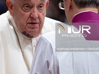 Pope Francis attends an Ordinary Public Consistory for the creation of new cardinals at St. Peter's Basilica in the Vatican on December 7, 2...