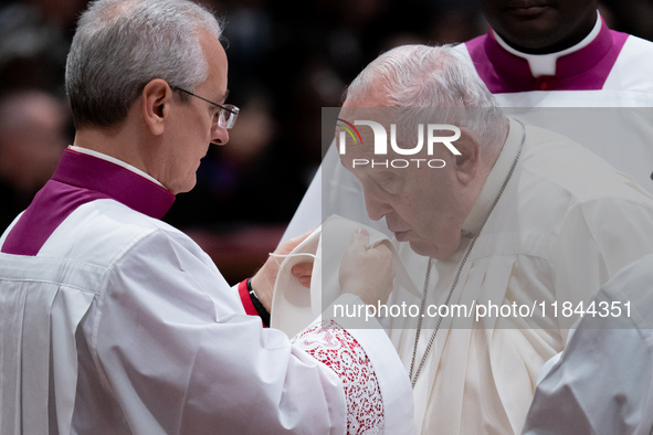 Pope Francis attends an Ordinary Public Consistory for the creation of new cardinals at St. Peter's Basilica in the Vatican on December 7, 2...