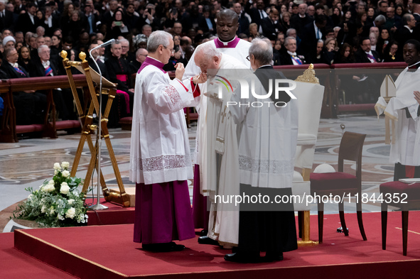 Pope Francis attends an Ordinary Public Consistory for the creation of new cardinals at St. Peter's Basilica in the Vatican on December 7, 2...