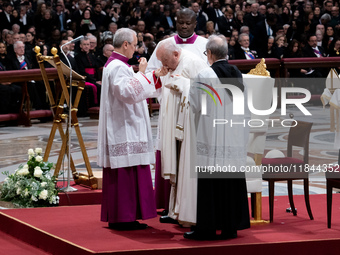 Pope Francis attends an Ordinary Public Consistory for the creation of new cardinals at St. Peter's Basilica in the Vatican on December 7, 2...