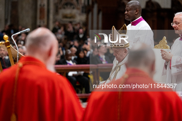 Pope Francis attends an Ordinary Public Consistory for the creation of new cardinals at St. Peter's Basilica in the Vatican on December 7, 2...