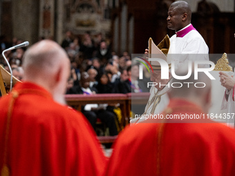 Pope Francis attends an Ordinary Public Consistory for the creation of new cardinals at St. Peter's Basilica in the Vatican on December 7, 2...