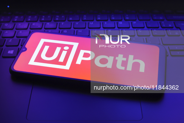 The UiPath, Inc. logo appears on the screen of a smartphone in Reno, United States, on December 7, 2024. 