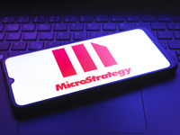 The MicroStrategy Incorporated logo appears on the screen of a smartphone in Reno, United States, on December 7, 2024. (