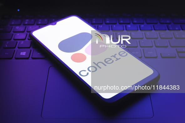 The Cohere, Inc. logo appears on the screen of a smartphone in Reno, United States, on December 7, 2024. 