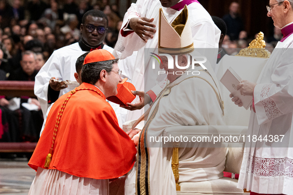 Canadian new Cardinal Frank Leo receives his biretta as he is appointed cardinal by Pope Francis during a consistory ceremony in the Saint P...