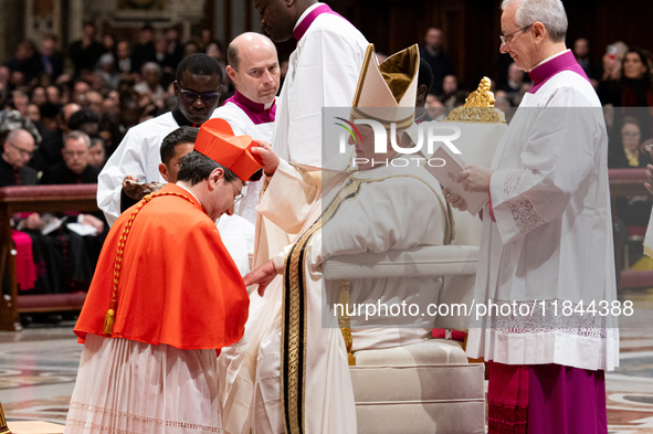 Canadian new Cardinal Frank Leo receives his biretta as he is appointed cardinal by Pope Francis during a consistory ceremony in the Saint P...