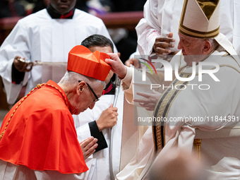 Peruvian Cardinal Carlos Gustavo Castillo Mattasoglio receives his biretta as he is appointed cardinal by Pope Francis during a consistory c...