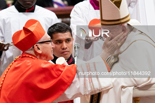 Peruvian Cardinal Carlos Gustavo Castillo Mattasoglio receives his biretta as he is appointed cardinal by Pope Francis during a consistory c...