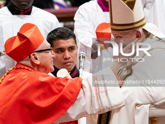 Peruvian Cardinal Carlos Gustavo Castillo Mattasoglio receives his biretta as he is appointed cardinal by Pope Francis during a consistory c...