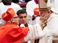 Peruvian Cardinal Carlos Gustavo Castillo Mattasoglio receives his biretta as he is appointed cardinal by Pope Francis during a consistory c...