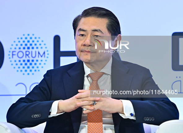 Henry Huiyao Wang, Founder and President of the Center for China and Globalization, takes part in a panel discussion during the Doha Forum 2...