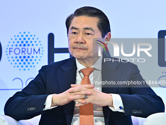 Henry Huiyao Wang, Founder and President of the Center for China and Globalization, takes part in a panel discussion during the Doha Forum 2...