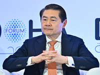 Henry Huiyao Wang, Founder and President of the Center for China and Globalization, takes part in a panel discussion during the Doha Forum 2...