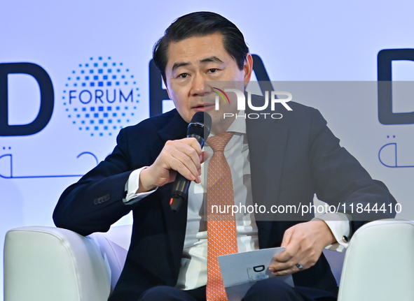 Henry Huiyao Wang, Founder and President of the Center for China and Globalization, takes part in a panel discussion during the Doha Forum 2...