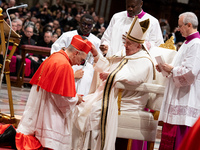 Italian Cardinal Baldassare Reina receives his biretta as he is appointed cardinal by Pope Francis during a consistory ceremony in the Saint...