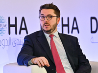 Charles Lister, Director of Syria & Counterterrorism Programs at the Middle East Institute, takes part in a panel discussion during the Doha...