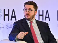 Charles Lister, Director of Syria & Counterterrorism Programs at the Middle East Institute, takes part in a panel discussion during the Doha...