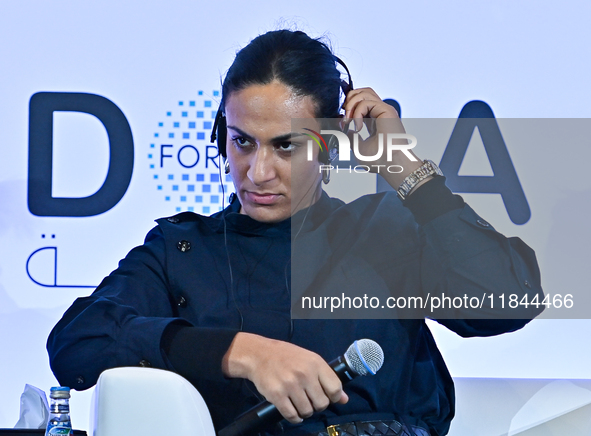 Imane Khelif, a professional boxer from Algeria, takes part in a panel discussion during the Doha Forum 2024 at Sheraton Grand Doha Resort &...