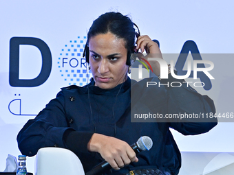 Imane Khelif, a professional boxer from Algeria, takes part in a panel discussion during the Doha Forum 2024 at Sheraton Grand Doha Resort &...