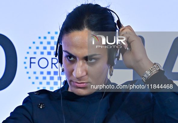 Imane Khelif, a professional boxer from Algeria, takes part in a panel discussion during the Doha Forum 2024 at Sheraton Grand Doha Resort &...