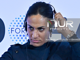 Imane Khelif, a professional boxer from Algeria, takes part in a panel discussion during the Doha Forum 2024 at Sheraton Grand Doha Resort &...