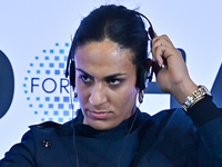 Imane Khelif, a professional boxer from Algeria, takes part in a panel discussion during the Doha Forum 2024 at Sheraton Grand Doha Resort &...