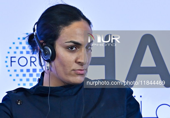 Imane Khelif, a professional boxer from Algeria, takes part in a panel discussion during the Doha Forum 2024 at Sheraton Grand Doha Resort &...