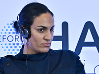 Imane Khelif, a professional boxer from Algeria, takes part in a panel discussion during the Doha Forum 2024 at Sheraton Grand Doha Resort &...