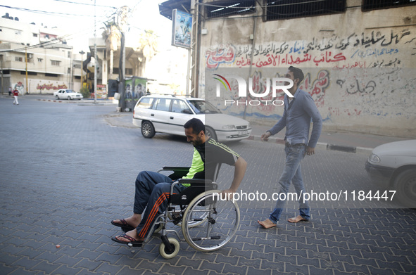 Image of Fadi Al-Deeb, 31 years old, in front of his house in Gaza City, on April 6, 2016. Fadi he is unemployed - and he studied IT. He is...