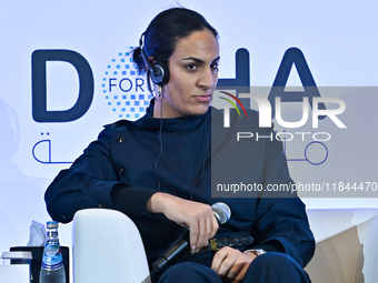 Imane Khelif, a professional boxer from Algeria, takes part in a panel discussion during the Doha Forum 2024 at Sheraton Grand Doha Resort &...