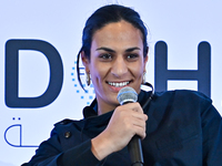 Imane Khelif, a professional boxer from Algeria, takes part in a panel discussion during the Doha Forum 2024 at Sheraton Grand Doha Resort &...