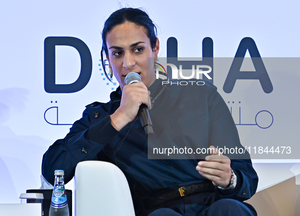 Imane Khelif, a professional boxer from Algeria, takes part in a panel discussion during the Doha Forum 2024 at Sheraton Grand Doha Resort &...