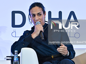 Imane Khelif, a professional boxer from Algeria, takes part in a panel discussion during the Doha Forum 2024 at Sheraton Grand Doha Resort &...