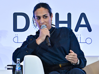 Imane Khelif, a professional boxer from Algeria, takes part in a panel discussion during the Doha Forum 2024 at Sheraton Grand Doha Resort &...