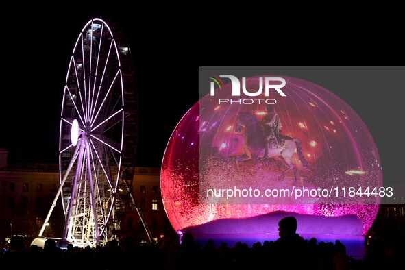 A religious festival of lights takes place in Lyon, France, on December 6, 2024. Illuminations light up the city at night. 