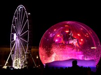 A religious festival of lights takes place in Lyon, France, on December 6, 2024. Illuminations light up the city at night. (