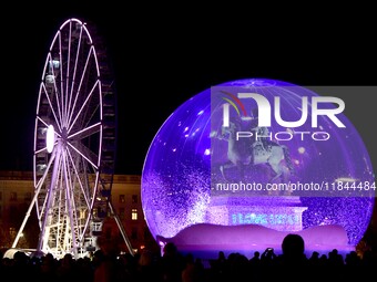 A religious festival of lights takes place in Lyon, France, on December 6, 2024. Illuminations light up the city at night. (