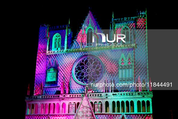 A religious festival of lights takes place in Lyon, France, on December 6, 2024. Illuminations light up the city at night. 