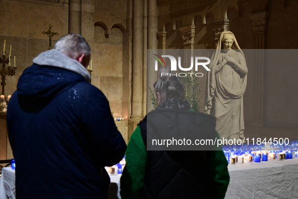 A religious festival of lights takes place in Lyon, France, on December 7, 2024. Illuminations light up the city at night. 