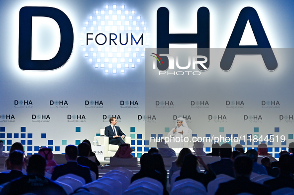 Qatar's Energy Minister and CEO of QatarEnergy, Saad Sherida al-Kaabi (R), speaks during the Doha Forum 2024 at Sheraton Grand Doha Resort &...