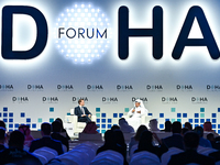 Qatar's Energy Minister and CEO of QatarEnergy, Saad Sherida al-Kaabi (R), speaks during the Doha Forum 2024 at Sheraton Grand Doha Resort &...