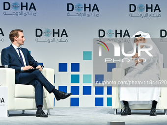 Qatar's Energy Minister and CEO of QatarEnergy, Saad Sherida al-Kaabi (R), speaks during the Doha Forum 2024 at Sheraton Grand Doha Resort &...